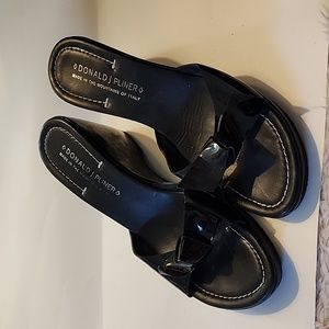Donald Pliner black wedge size 10. New